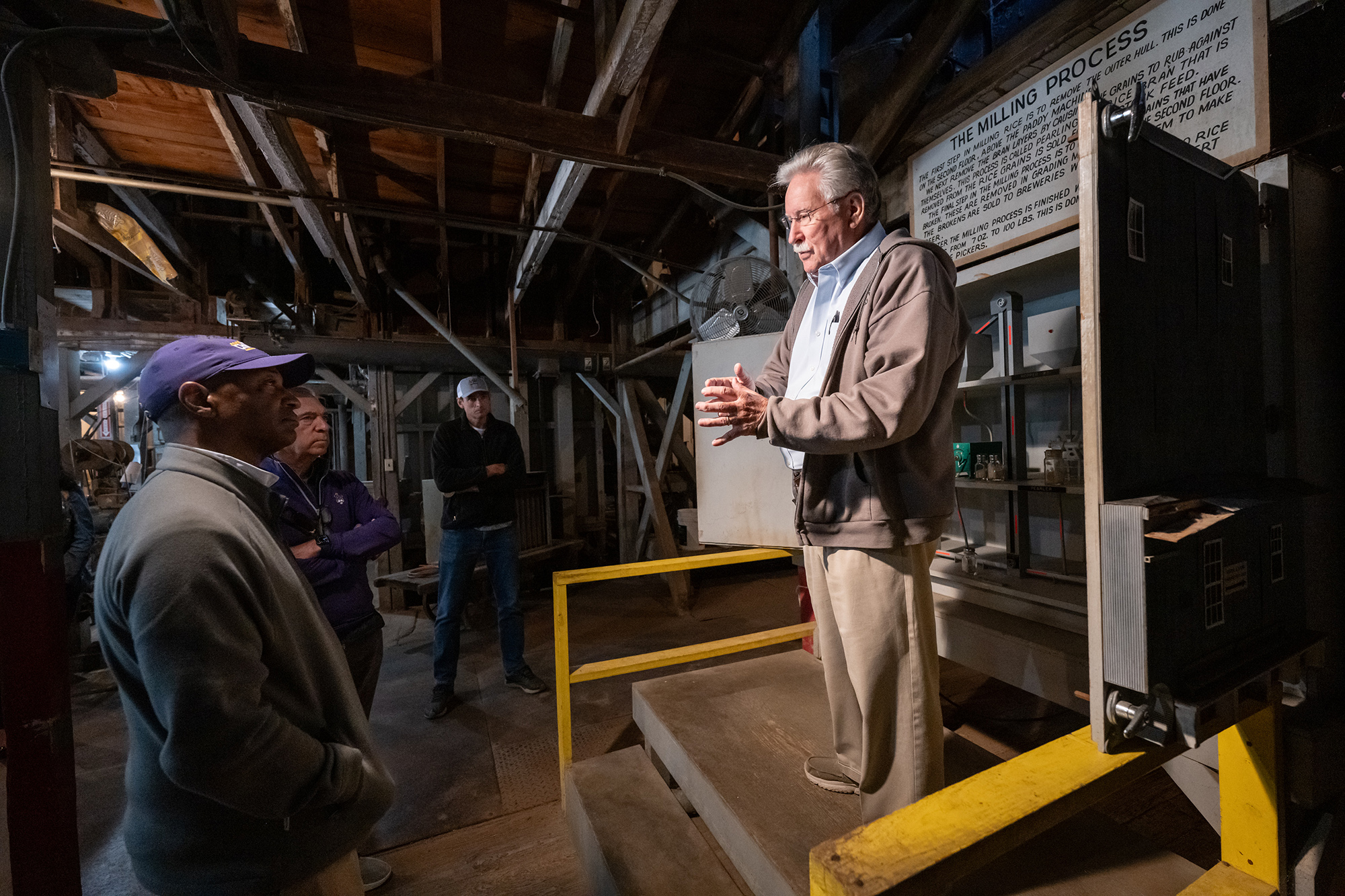 William F. Tate listens to Mike Davis