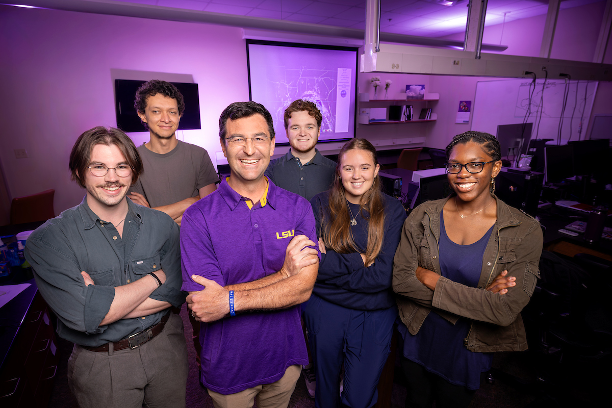 Team photo of Paul Miller and COMET Lab student workers
