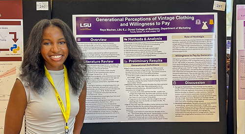 Reya Machen stands in front of a research poster at LSU Discovery Day 2025