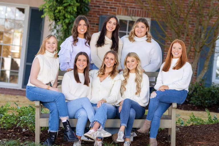 kappa delta 2022 goverining council seated on a bench