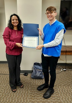 Outstanding Graduate Minor Awardee Awardee Austin Svedjan and Awards Chair Asiya Alam