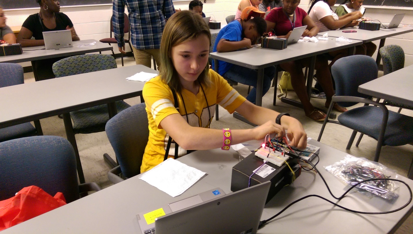 A participant at the Louisiana 4-H Clover College “Tracking Toxins: Shining Light on Pollution” session, held June 21-22, 2018 at Louisiana State University, building a particulate matter (PM) detector.
